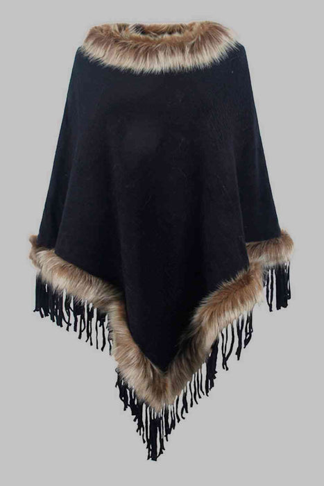 Stylish poncho features faux fur trim