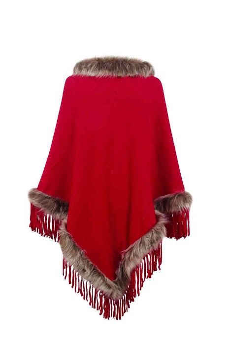 Stylish poncho features faux fur trim