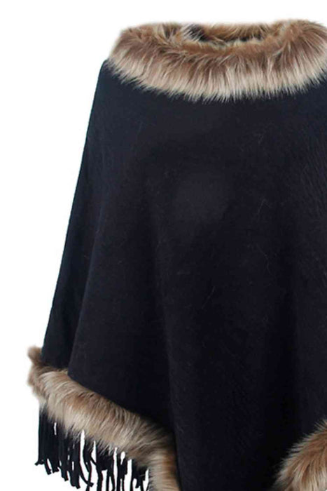 Stylish poncho features faux fur trim